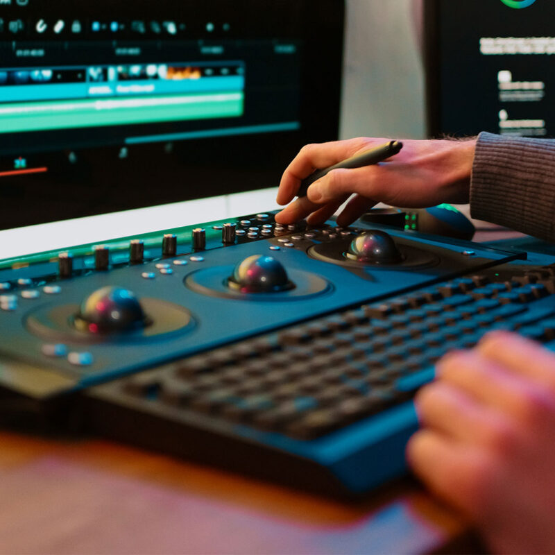 DaVinci Resolve editor working on color grading and video editing in a professional post-production environment